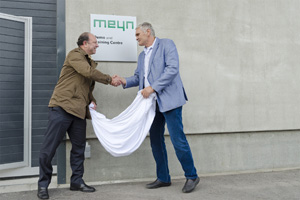 Scott Russell (left) and Willem Wals (right) officially open the Meyn Demo and training centre.