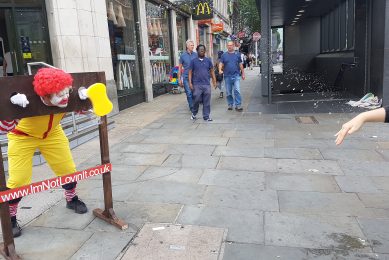 Ronald in the stocks in McDonald s chicken protest