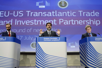 Daniel Rosario, European Commission's spokesperson for Agriculture and Rural Development, Ignacio Garcia Bercero, European Union chief negociator for the Transatlantic Trade and Investment Partnership (TTIP), and Dan Mullaney, US TTIP chief negociator, deliver a press conference at the end of the 10th round of the TTIP negociations at the European Commission headquarters in Brussels. If concluded, the TTIP would be the world's biggest trade deal, linking about 60 percent of the globe's economic output in a colossal market of 850 million consumers, creating a free-trade corridor from Hawaii to Lithuania.